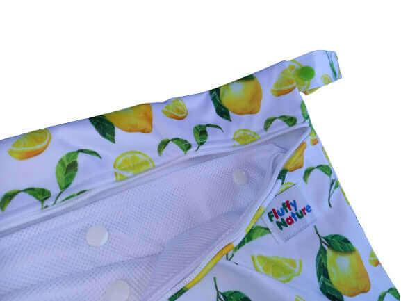 Fluffy Nature Wetbag Citrus mit einknöpfbarem Wäschenetz - Windelposchi